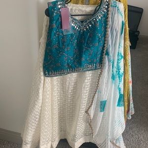 Silk thredaed work lehenga with mirrored work blouse and georgette chinni